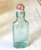 Glass Pebble Top Collecting Bottles
