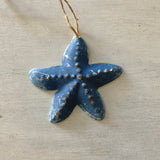 Weathered Metal Shell Ornament