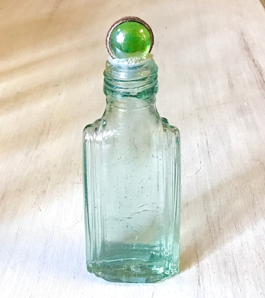Glass Pebble Top Collecting Bottles