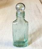 Glass Pebble Top Collecting Bottles