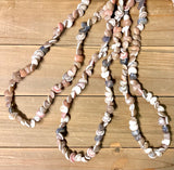 Umbonium shell leis