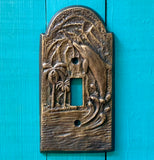 Dolphin Brass Switch Plate