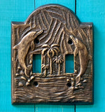 Dolphin Brass Switch Plate