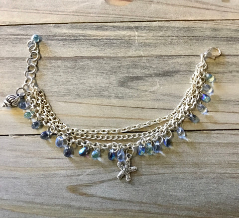 Shell charm clasp bracelet