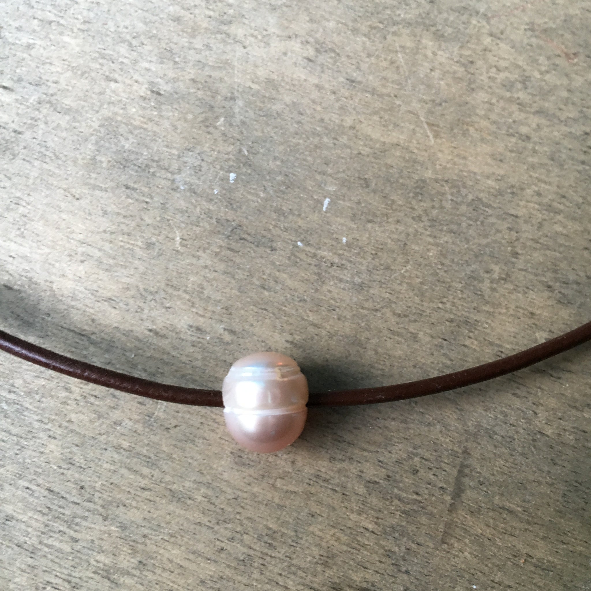 One pearl necklace 2025 on leather cord